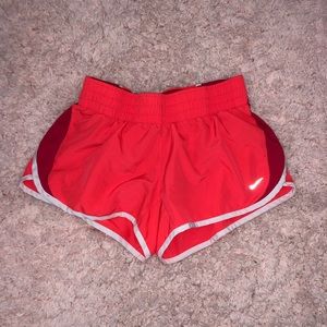 Nike Bright orange and pink running shorts